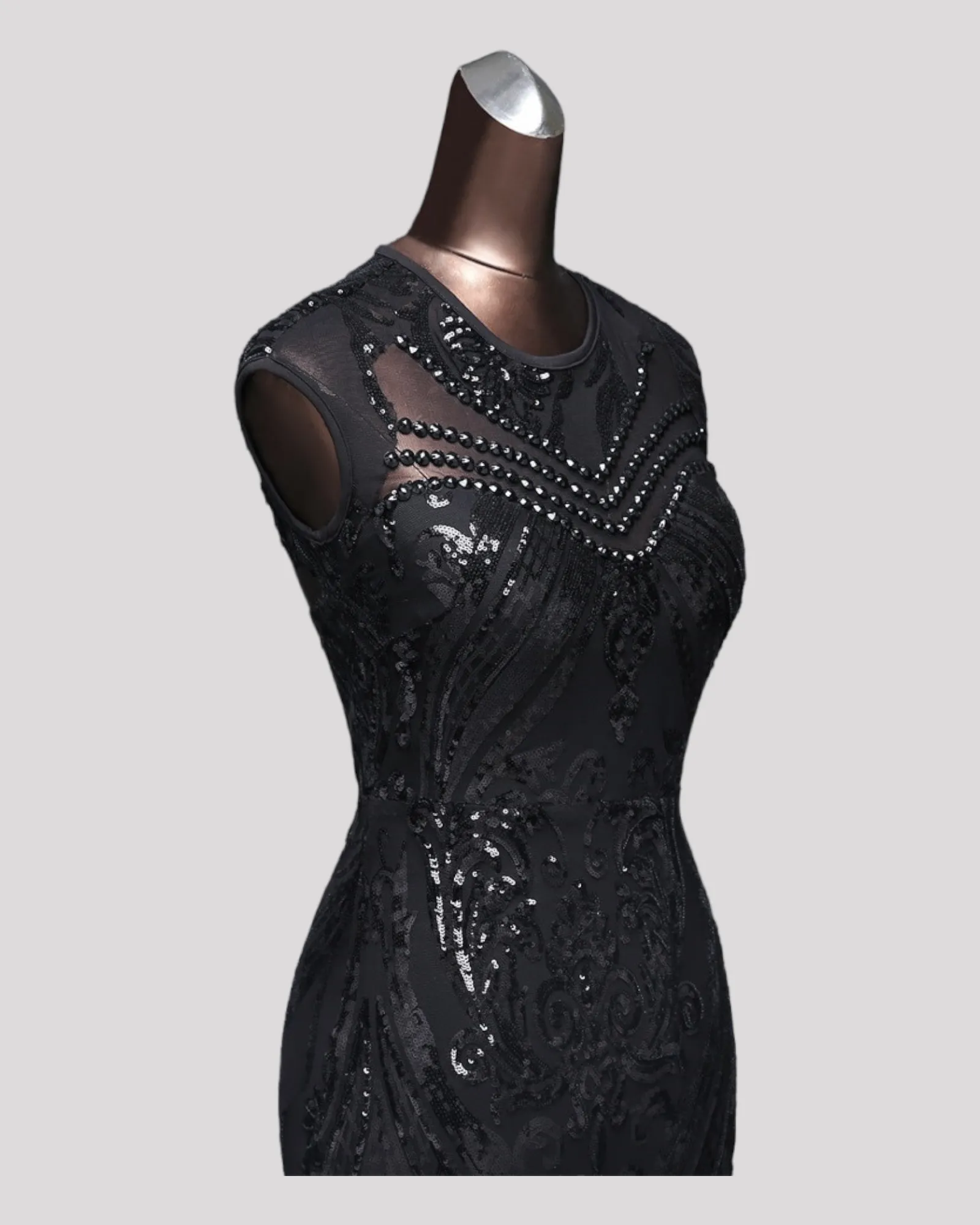 Beautiful Sequin Mermaid Style Evening Dress with high Neck and Cut out Back Feature